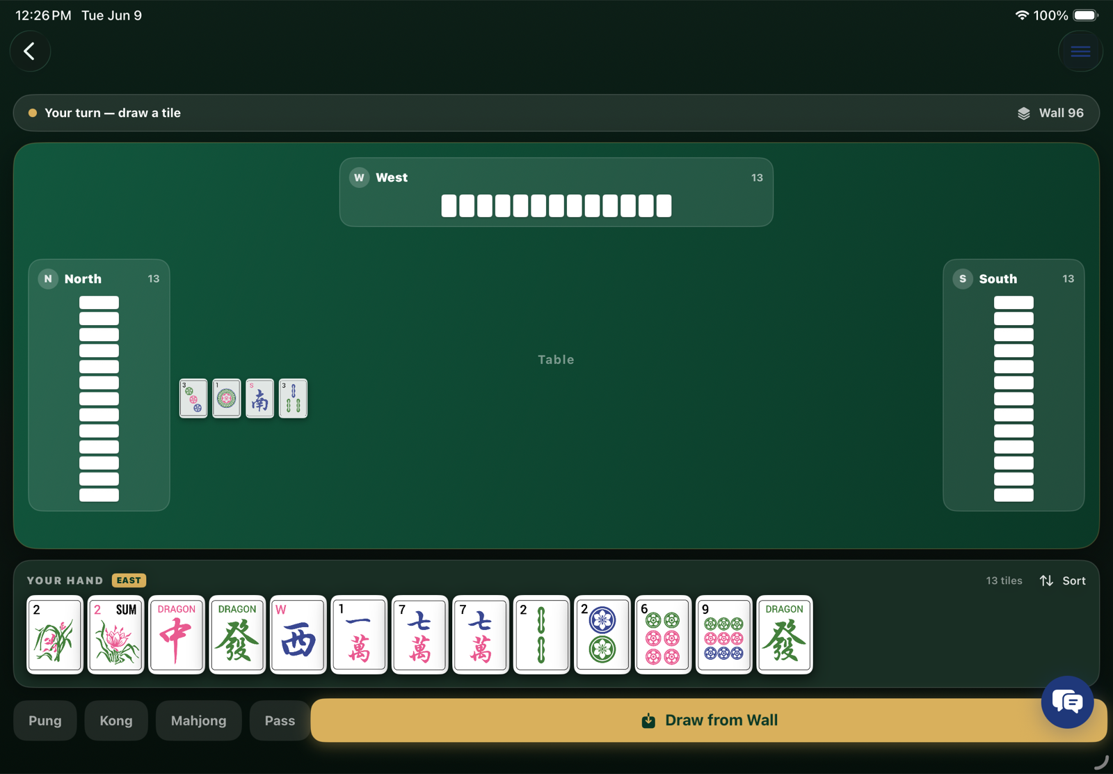Tile Wise Play a Game table — your hand at the bottom, three AI opponents seated around an emerald felt table, and the shared discard pile in the center